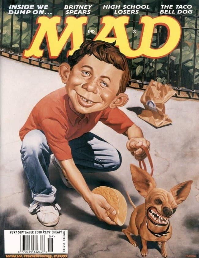 A clever vintage mad magazine cover from September 2000 parodying the Taco Bell chihuahua. The tiny dog is shown holding a leash and walking Alfred E. Neuman, who is hunched over like a pet ready to eat a taco off the ground.