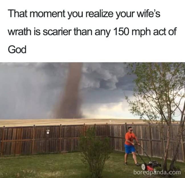 Man mowing lawn with massive tornado in background captioned "wife's wrath is scarier than any act of God"