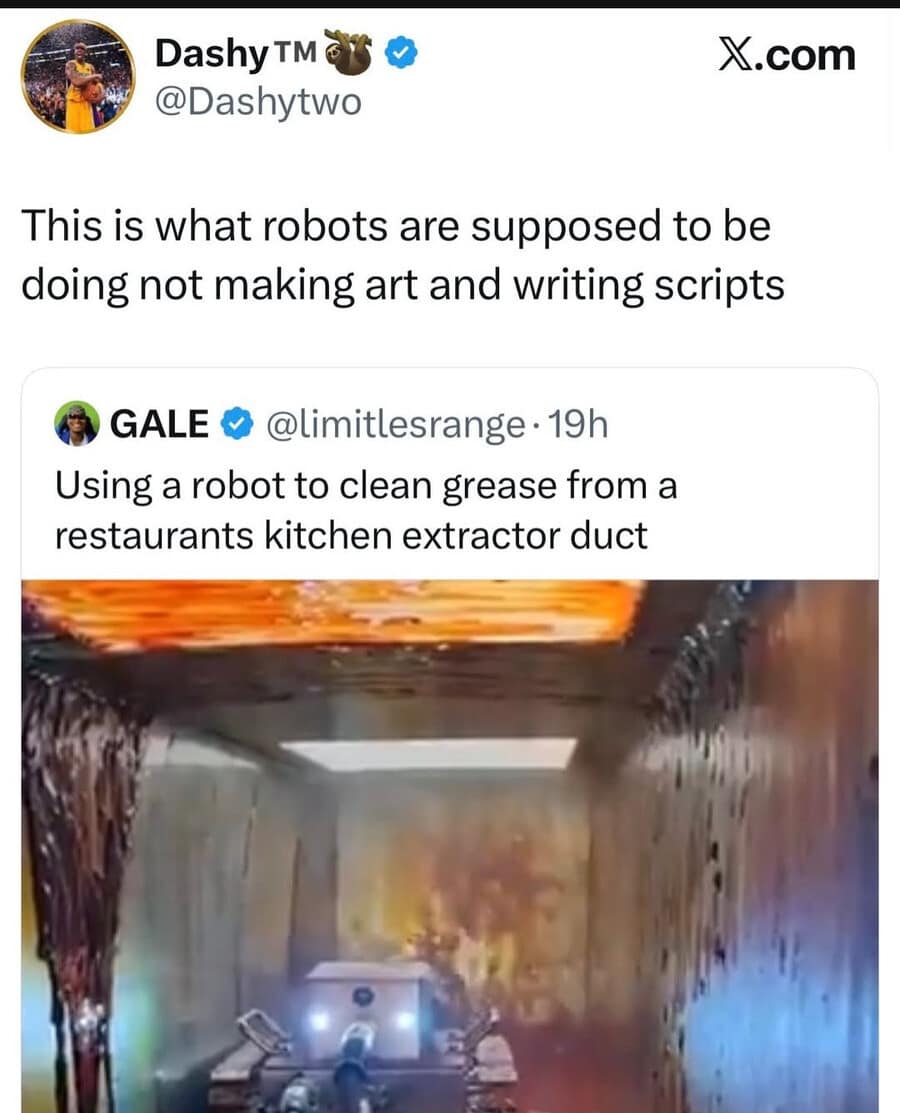 A screenshot of an X post by Dashy TM featuring a small, boxy robot with bright headlights navigating a dark, grease-caked industrial kitchen duct. The text argues that this disgusting manual labor is what robots should be doing instead of replacing human artists and writers.