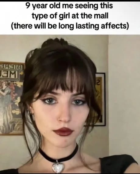 A portrait of a woman with a dark aesthetic, featuring messy bangs, winged eyeliner, dark red lipstick, and a black choker with a silver heart locket. The overlay text jokes about how seeing this specific mall goth style as a 9-year-old child had a permanent psychological impact on the viewer.