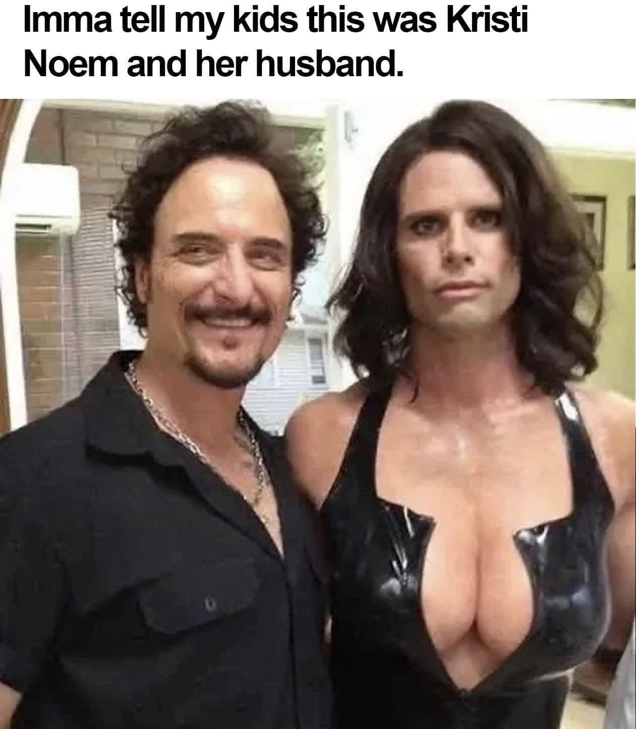 A chaotic meme dump entry showing a photo of a man with a mustache and a Walton Goggins in a high-cut black latex bodysuit. The caption delivers a political burn: "Imma tell my kids this was Kristi Noem and her husband."