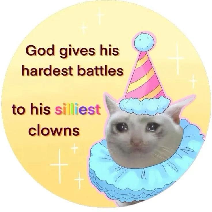 A heartbreaking but hilarious meme showing a crying white cat dressed in a pink striped party hat and a blue ruffled clown collar, with text declaring that God reserves the toughest battles for his silliest clowns.