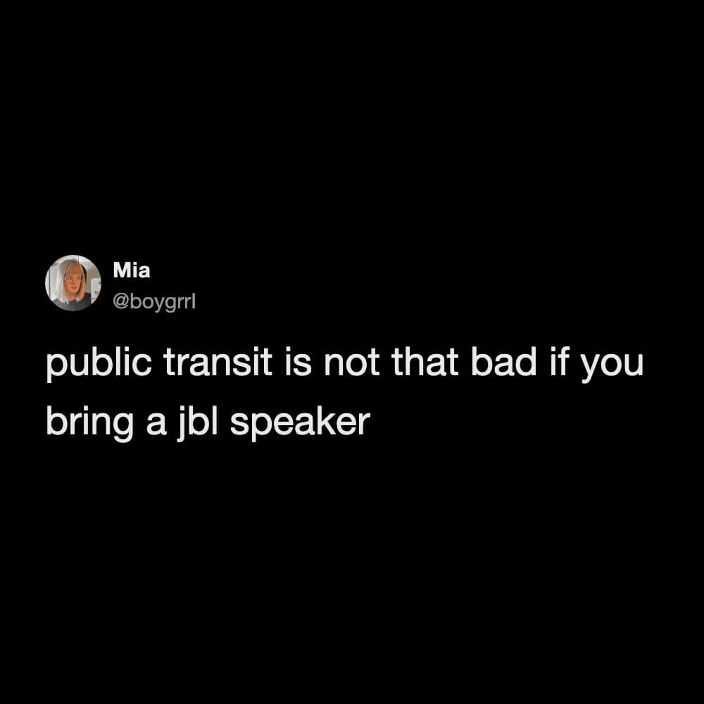 A minimalist black-background tweet from @boygrrl that captures the universal dread of public commuting. The text reads: "public transit is not that bad if you bring a jbl speaker," sarcastically referencing the most annoying type of passenger.