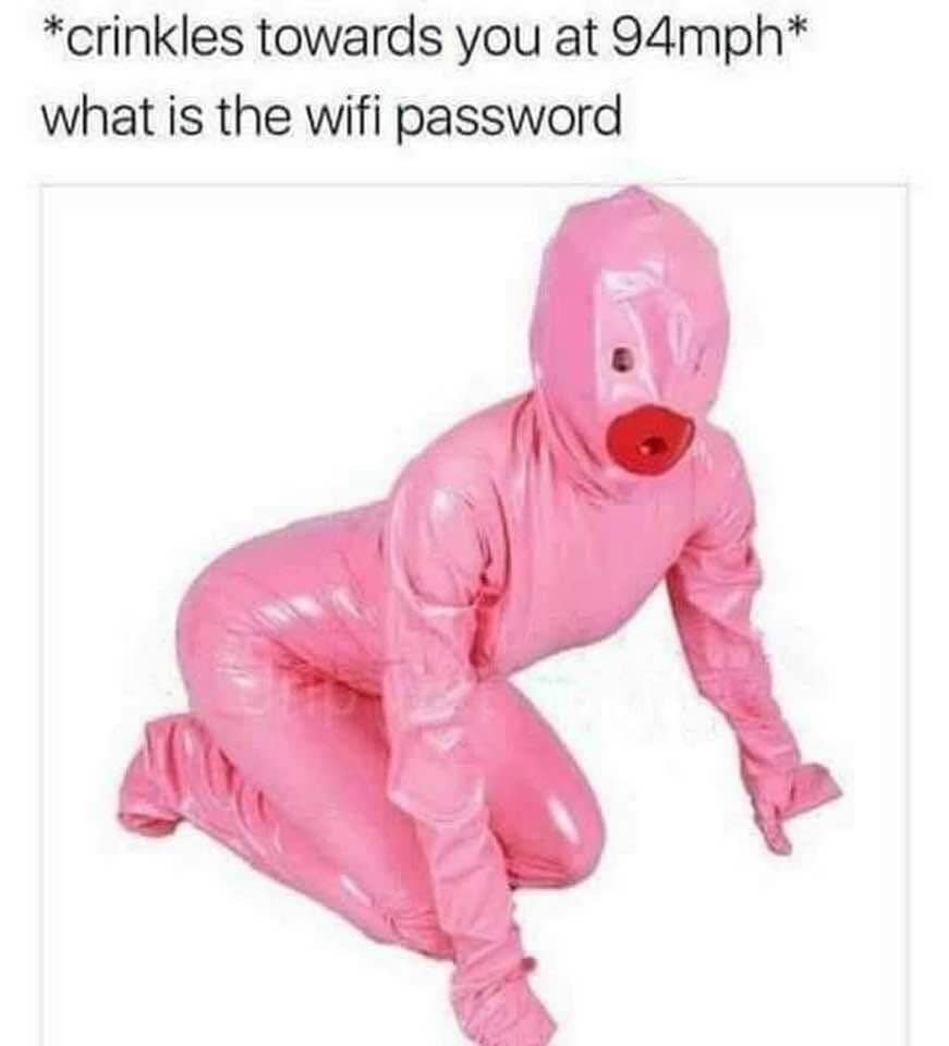 A surreal and slightly alarming meme featuring a person in a full-body, high-gloss pink latex suit crawling on all fours. The text describes them crinkling toward the viewer at 94mph to ask for the wifi password.