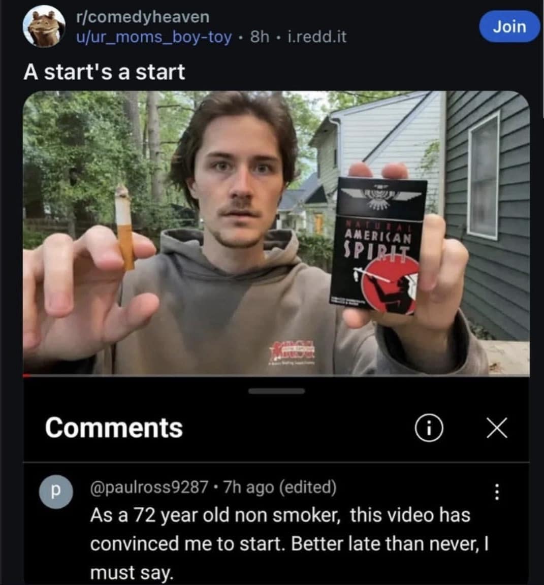 funny meme from r/comedyheaven featuring a video still of a young man holding a cigarette and a pack of American Spirits. A hilarious comment from a supposed 72-year-old non-smoker claims the video was so convincing they’ve decided to pick up the habit.