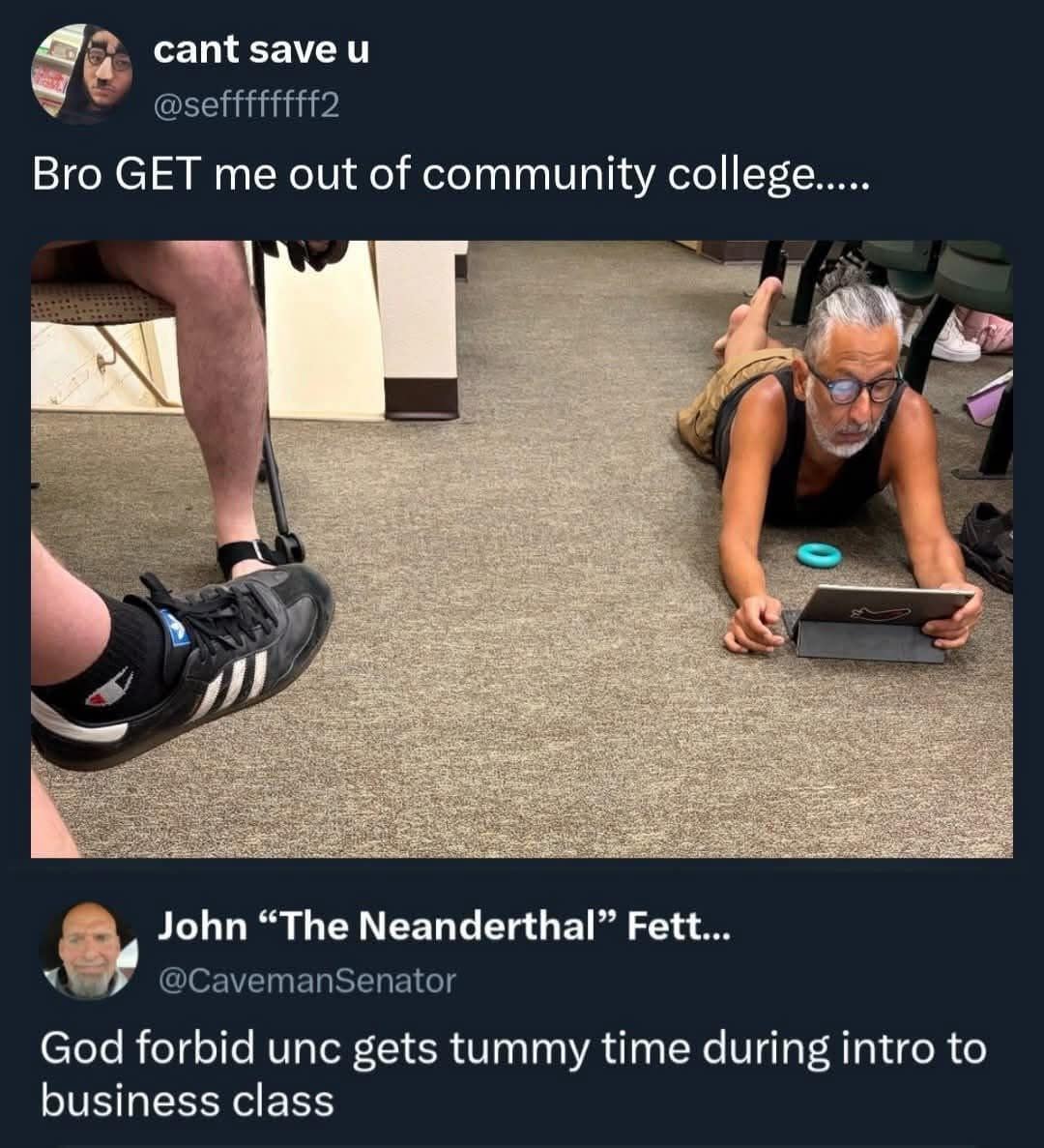 funny meme showing an older man lying flat on his stomach on the carpet of a community college classroom while looking at a tablet. The quote-tweet below reads: "God forbid unc gets tummy time during intro to business class."