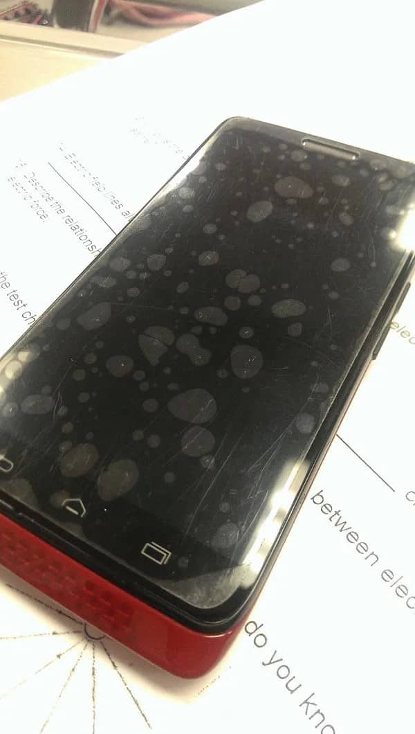 Phone screen protector covered in large unsightly air bubbles ruining display visibility