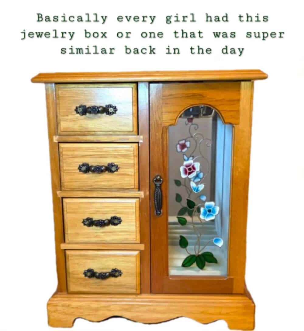 classic millennial meme featuring a 90s wooden jewelry box with a mirrored door etched with blue and pink flowers. The text notes that basically every girl owned this or a similar miniature cabinet to store their choker necklaces and butterfly clips.