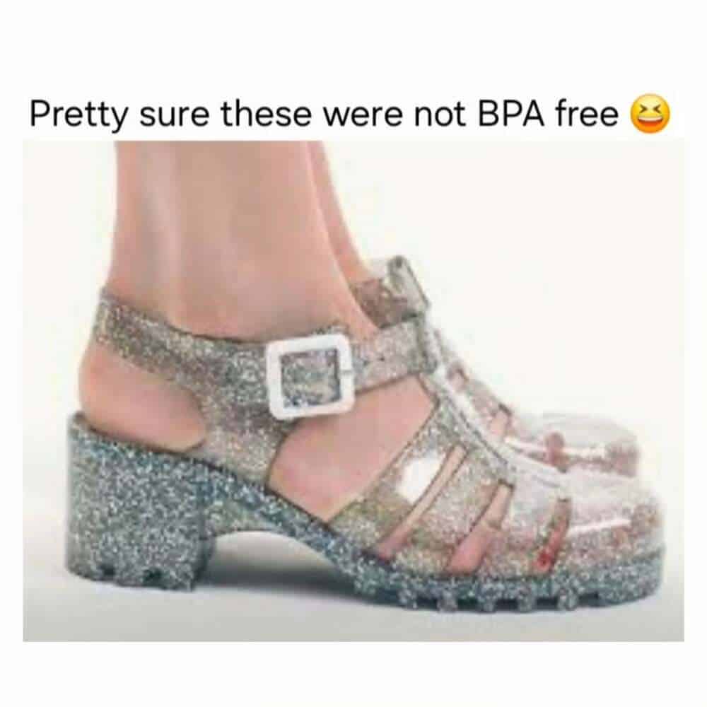 A close-up of glittery, semi-transparent jelly sandals with a chunky heel. This millennial meme jokes about the questionable chemical composition of the flexible plastic, noting they probably weren't BPA-free.