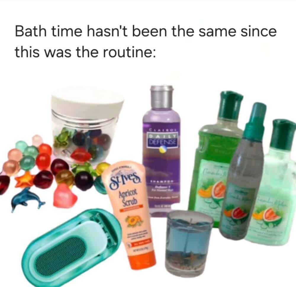 A comprehensive millennial meme bath-time routine starter pack. It features 90s staples like St. Ives Apricot Scrub (the skin-shredder), gelatinous bath oil beads in shapes like dolphins, and the chemical-scented glory of Clairol Daily Defense.