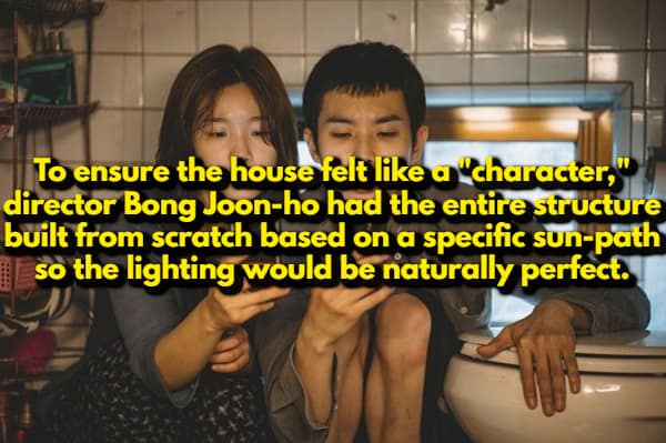 A random movie fact showing the Kim siblings from Parasite huddled together in a cramped bathroom. The text explains that director Bong Joon-ho had the entire house built from scratch to follow a specific sun-path for naturally perfect lighting.