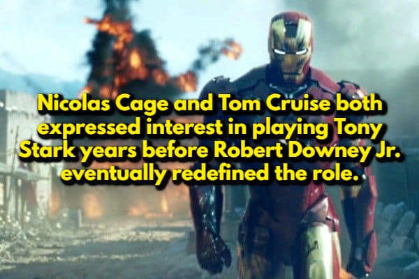 A random movie fact with Iron Man walking away from a massive explosion. The text reveals that Tom Cruise and Nicolas Cage both wanted the role of Tony Stark years before Robert Downey Jr. eventually redefined it.