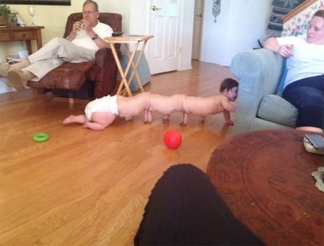 A panorama glitch of a crawling baby appearing as a long, multi-legged creature.