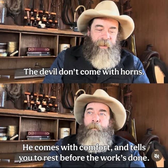 A bearded cowboy in a hat giving a stern warning about the devil and comfort.