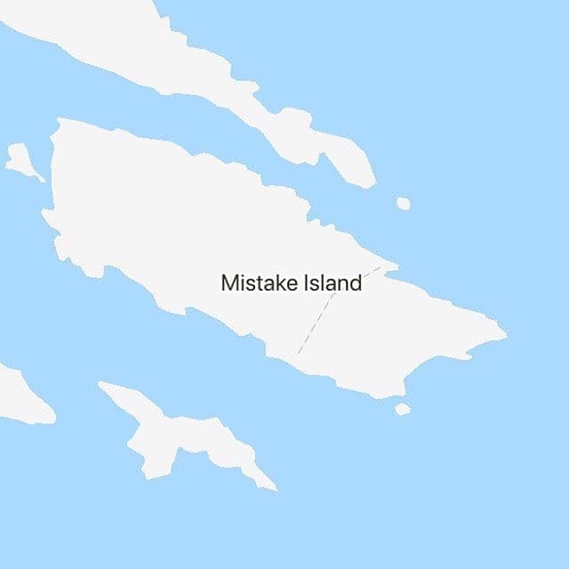 Map displaying irregular white landmass in blue water clearly labeled Mistake Island near surrounding isles.