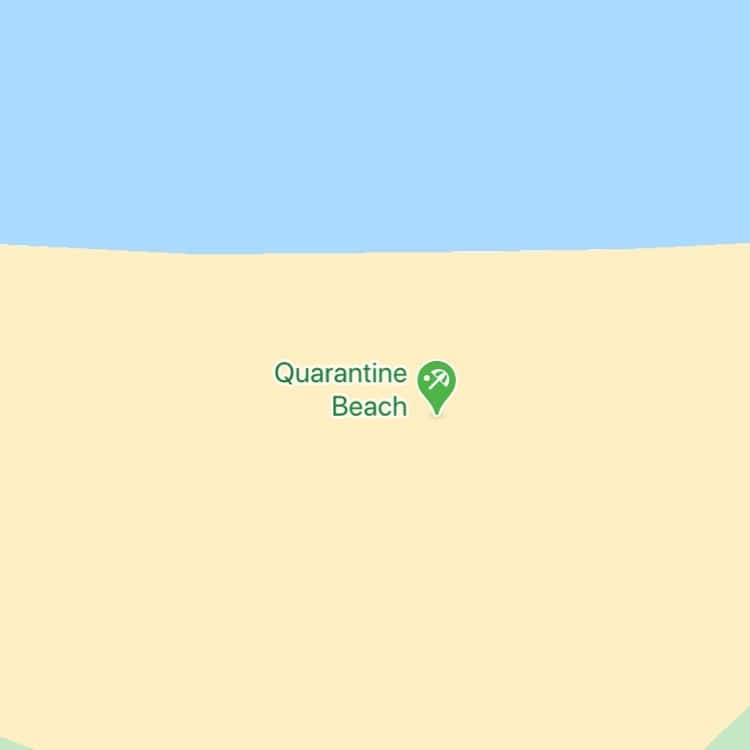 Map showing yellow sandy beach area labeled Quarantine Beach with blue ocean and a pin marker.