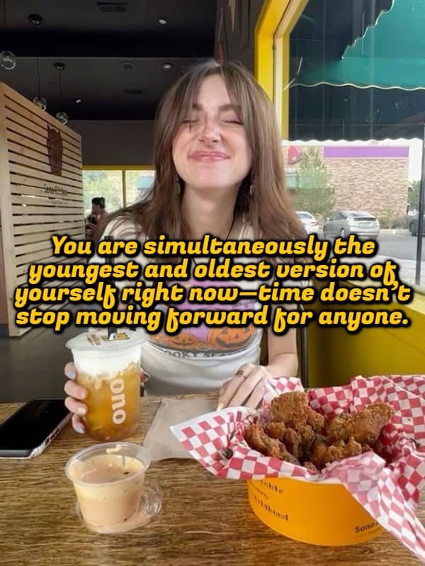 Girl smiling at a table with food and a shower thought about time moving.