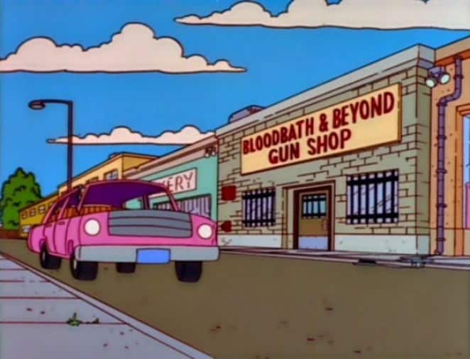 Simpsons street scene showing Bloodbath and Beyond Gun Shop storefront parody of Bed Bath and Beyond