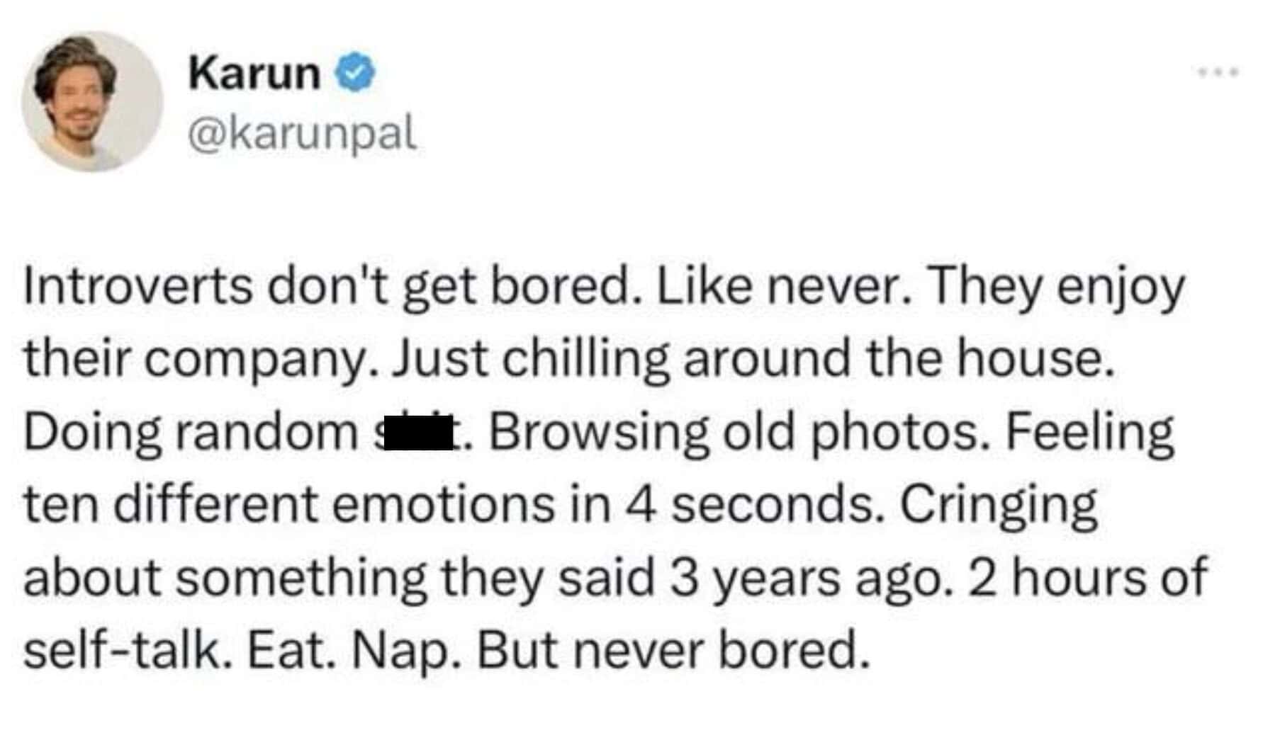 Tweet claiming introverts never get bored, listing chaotic solo activities and emotional spirals instead.