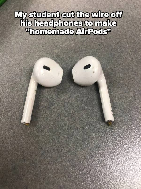 Student's broken wired earbuds with cords cut off to resemble homemade AirPods craft