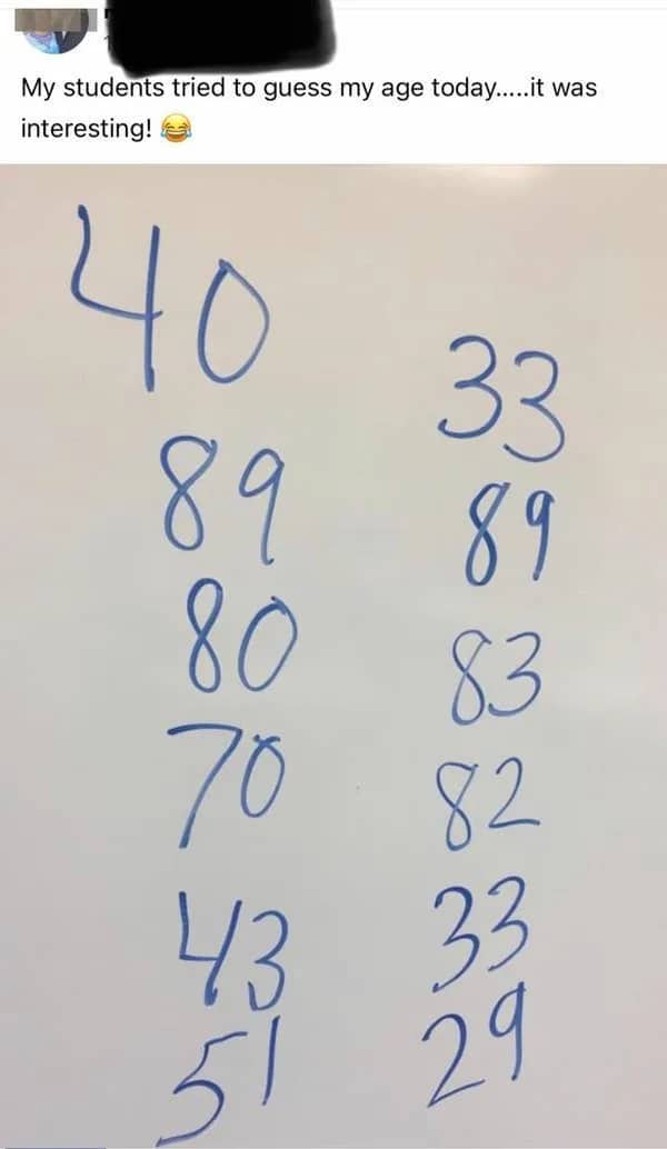 Whiteboard showing students' wildly inaccurate age guesses for their teacher ranging from 29 to 89