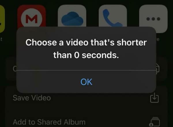 An iPhone screen displaying a paradoxical logic error—a software tech fail pop-up that demands the user "Choose a video that's shorter than 0 seconds" to proceed.