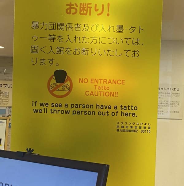 A threatening translation fail on a "no tattoos" sign at a public spa. The text misspelled "person" as "parson" and "tattoo" as "tatto," resulting in the aggressive warning: "if we see a parson have a tatto we'll throw parson out of here."