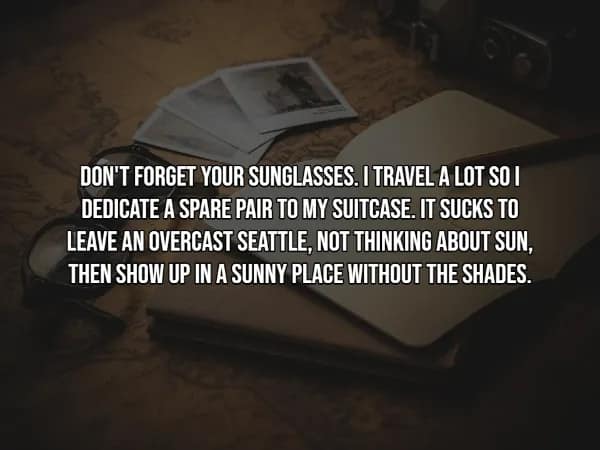 A travel hack about always keeping a spare pair of sunglasses inside your luggage to avoid being stranded in sunny locations. The background is a dim, atmospheric shot of an open notebook on a map.