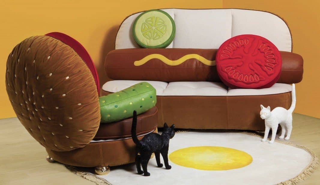 Hamburger armchair and hot dog sofa set with food toppings pillows and fried egg area rug and two cats