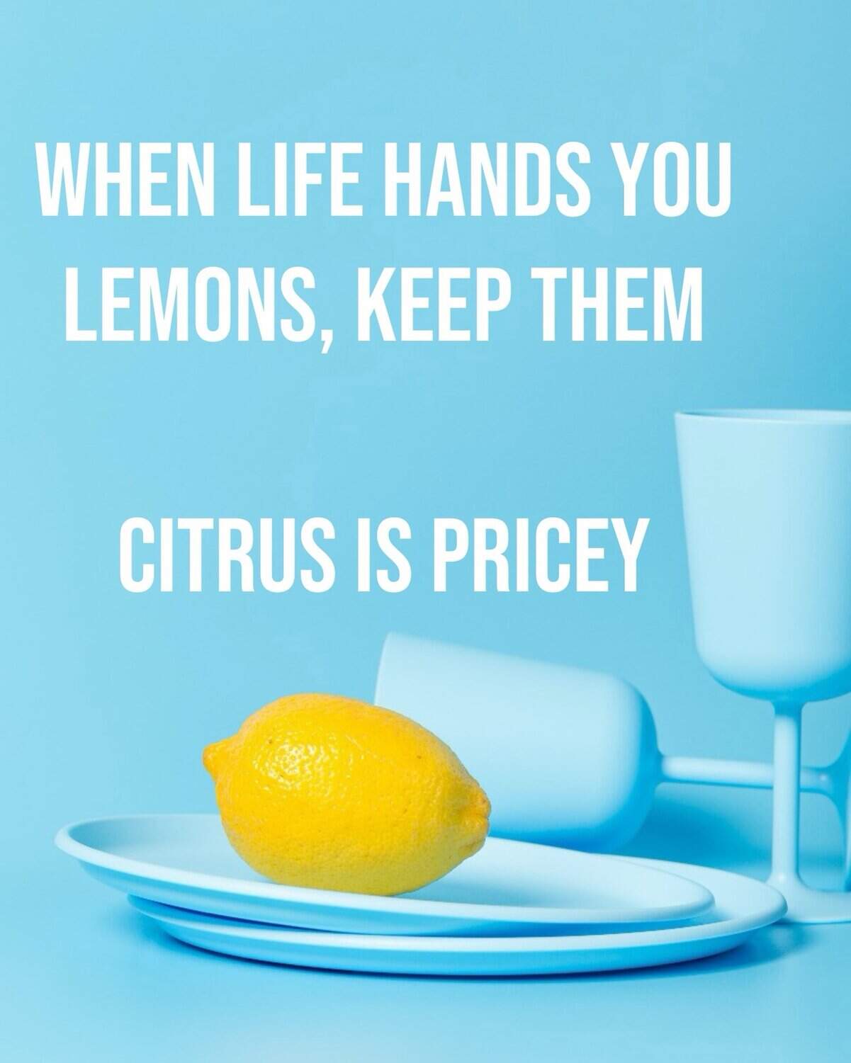 Minimalist blue still life with lemon and glassware advising to keep lemons since citrus is expensive.