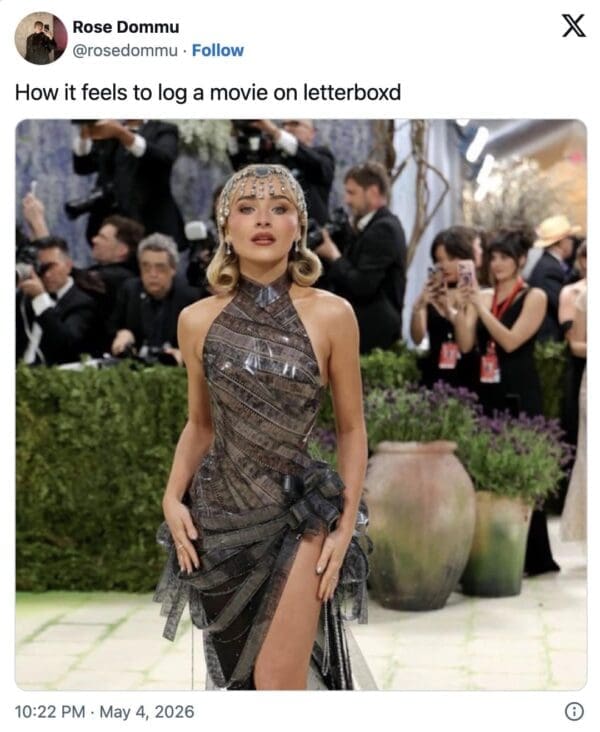 2026 Met Gala meme featuring Sabrina Carpenter in a dress constructed entirely from shimmering movie film strips, used to describe the "main character energy" of logging a movie on Letterboxd.