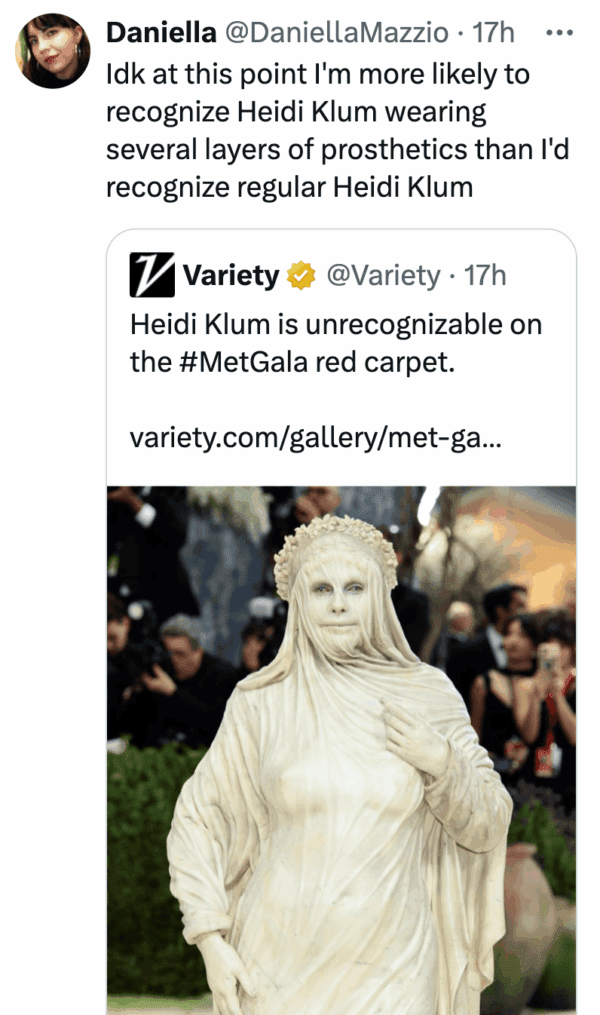 2026 Met Gala meme showing Heidi Klum completely encased in white, draped fabric that looks like a weathered marble statue, making her face almost entirely unrecognizable.