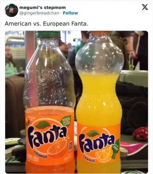 A side-by-side comparison bottle photo showing neon orange American Fanta next to yellow European Fanta.
