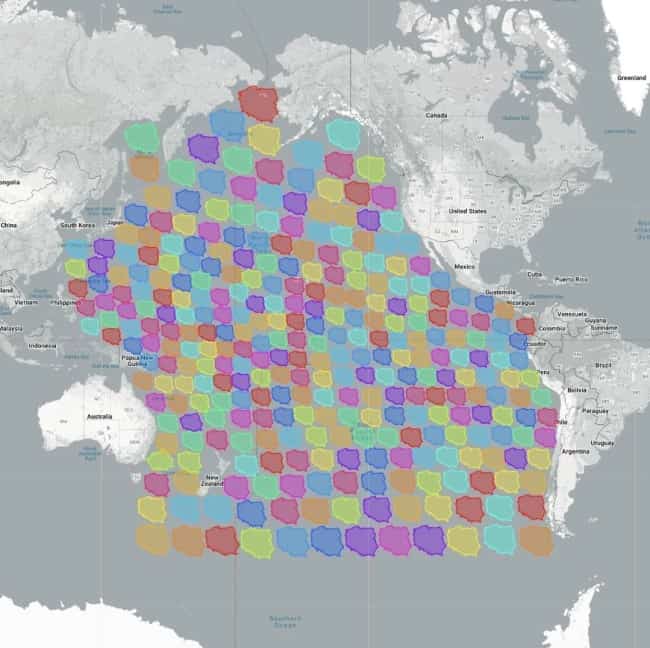 A digital world map showing the Pacific Ocean completely covered by repeating tiled shapes of Wisconsin.