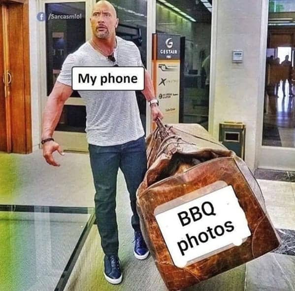A funny storage-capacity bbq meme featuring a paparazzi photo of Dwayne "The Rock" Johnson labeled "My phone" easily hauling a comically massive leather duffel bag labeled "BBQ photos."