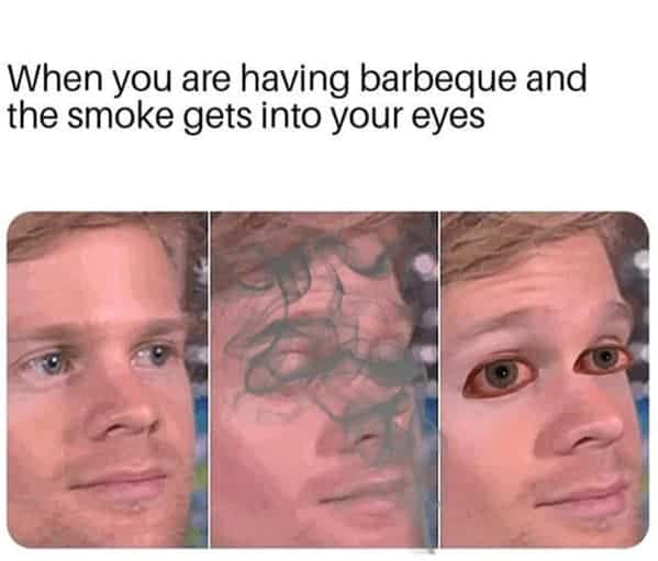 A highly accurate three-panel bbq meme adapts the blinking white guy reaction template to show thick grey wood smoke blowing directly across his face, leaving his eyes heavily bloodshot, red, and irritated in the final panel.