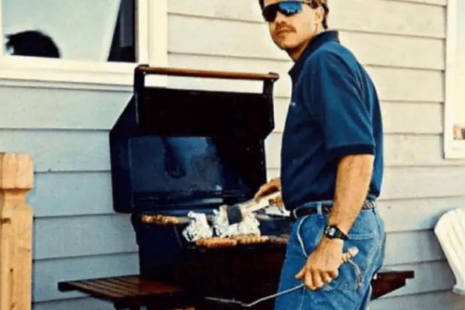 A trending bbq meme collection capturing backyard grilling culture and pitmaster humor, highlighted by a gas grill engulfed in a massive wall of fire, a close-up of someone wearing the ultimate dad-style white New Balance sneakers, and a massive leather duffel bag labeled "BBQ photos" hauled by Dwayne Johnson.