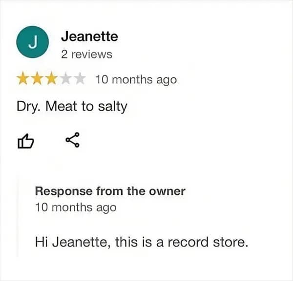 A screenshot of a 2-star Google review by "Jeanette." The text of the review says, "Dry. Meat to salty". Below it is a response from the owner stating, "Hi Jeanette, this is a record store."