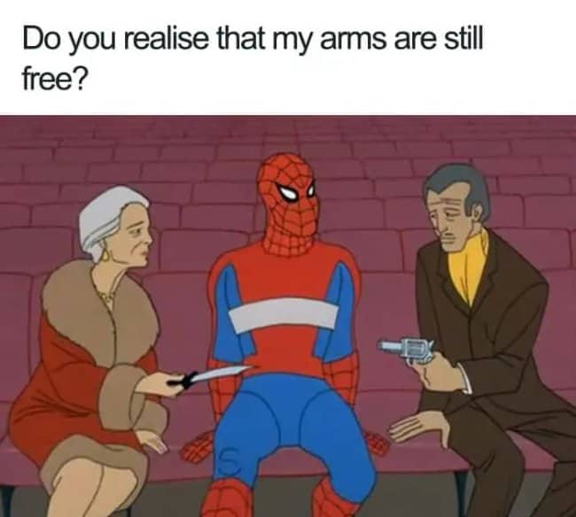 Spiderman from an old cartoon sits tied up with rope on a movie theater seat. Text: "Do you realise that my arms are still free?". The people next to him are not paying attention to this.