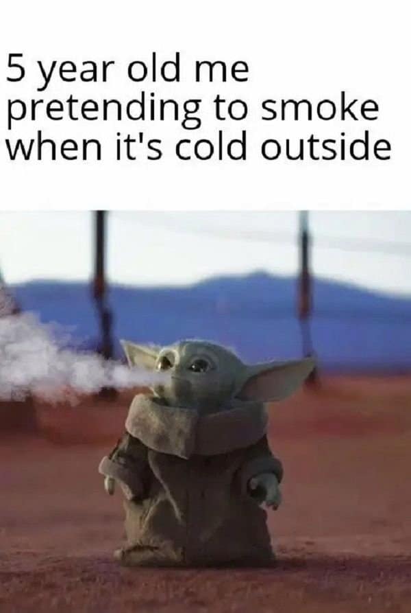 Grogu, the popular baby Yoda character from The Mandalorian, exhales a puff of white condensation in the winter air in a viral childhood meme about mimicking adult habits in cold weather.