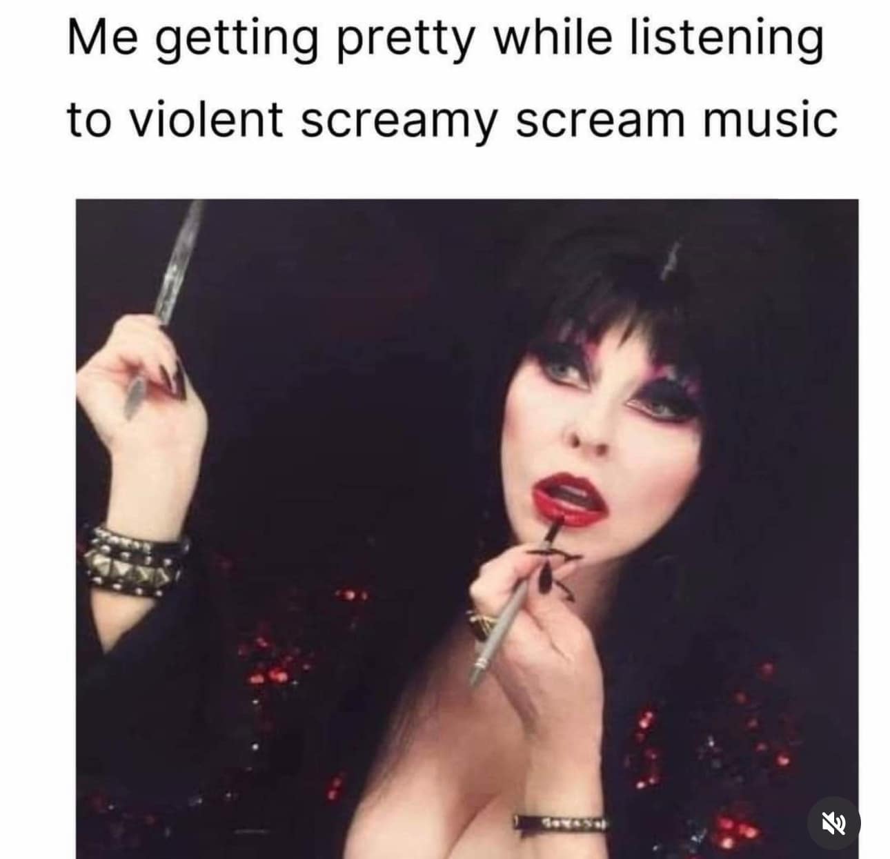 old meme featuring Elvira, Mistress of the Dark, applying makeup, captioned about the contrast of "getting pretty" while listening to "violent screamy scream music."