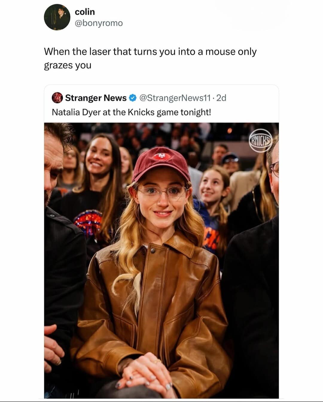 Stranger Things actress Natalia Dyer sitting court-side at a New York Knicks basketball game is playfully teased in a classic meme comparing her sharp, delicate facial structure to a mouse transformation ray gun.