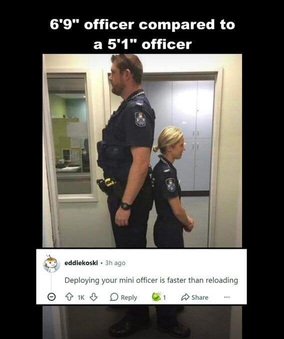 A viral photo comparing a 6'9" police officer to a 5'1" female officer standing back-to-back. A Reddit comment below from eddiekoski jokes: "Deploying your mini officer is faster than reloading," applying FPS gaming logic to real life.