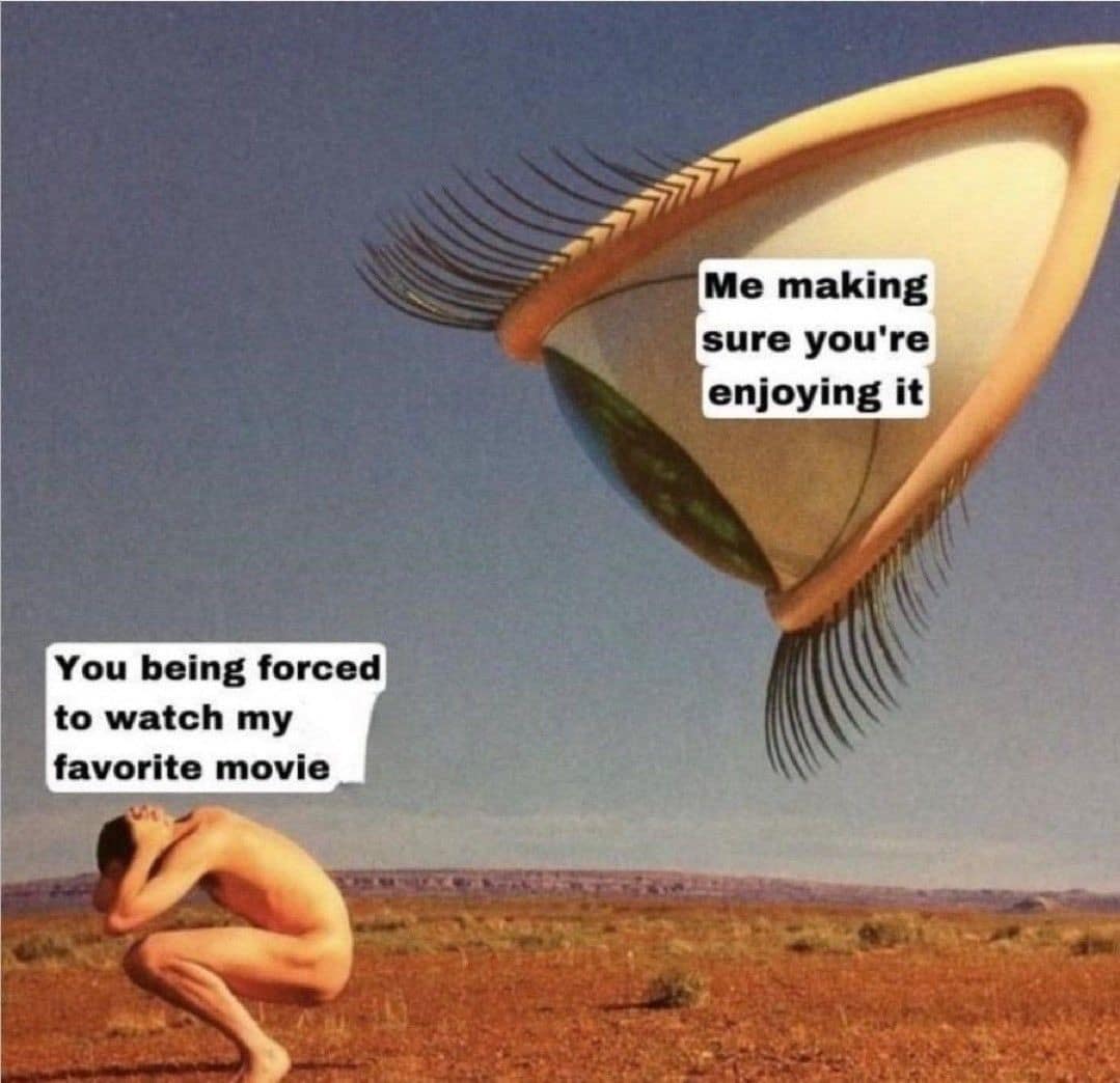 A surrealist classic meme illustration of a giant floating human eye hovering over a tiny person in a vast desert, representing the intense pressure of making sure a friend is enjoying your favorite movie while they are "forced" to watch it.