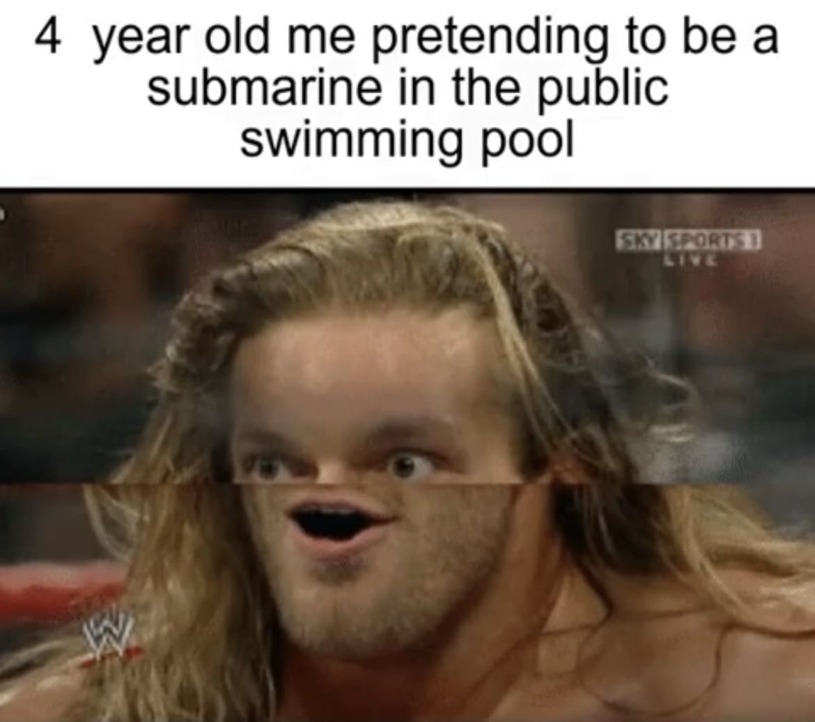 A mirror-distorted television broadcast frame of a professional wrestler with his mouth squished up directly beneath his eyes channels a nostalgic classic meme about pretending to be a submarine in a public pool.