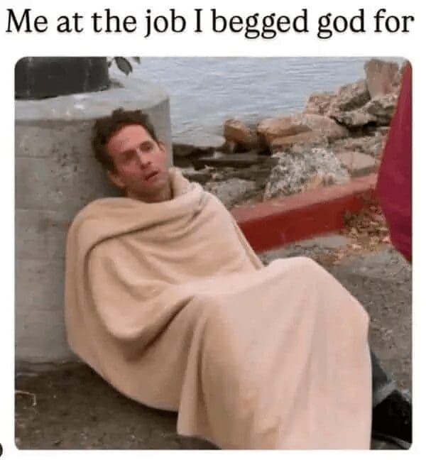 classic meme featuring a pale, exhausted Dennis Reynolds from "It's Always Sunny in Philadelphia" wrapped in a blanket on a pier. The text reads: "Me at the job I begged god for."