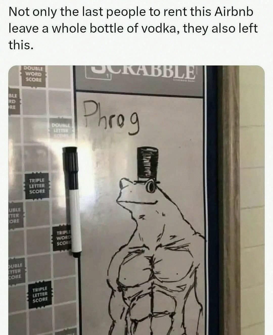 classic meme of an Airbnb find where previous renters left a bottle of vodka and a detailed dry-erase drawing of a muscular frog in a top hat labeled "Phrog" on a Scrabble board.