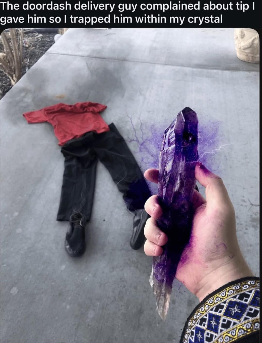 classic meme showing a hand holding a large, glowing purple crystal over a set of empty clothes (red shirt and black pants) lying flat on the pavement, captioned "The doordash delivery guy complained about tip I gave him so I trapped him within my crystal."