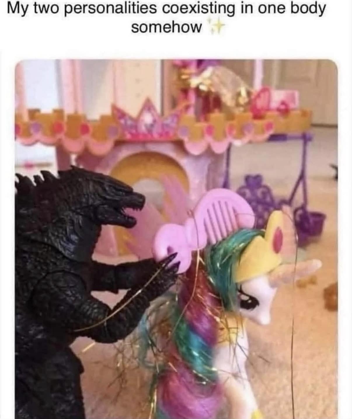 A classic meme showing a Godzilla action figure gently using a pink toy comb to brush the hair of a My Little Pony unicorn, captioned "My two personalities coexisting in one body somehow."