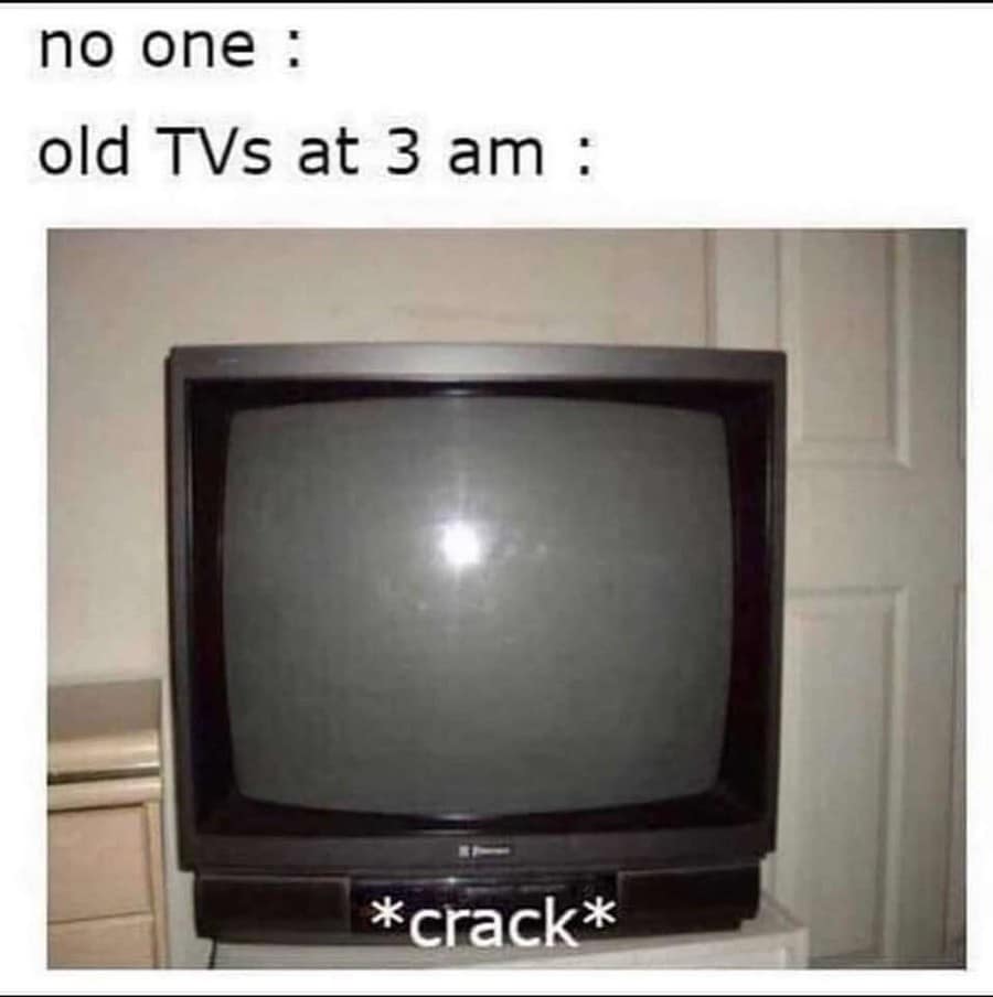 A classic meme image showing a front view of a vintage, boxy black CRT television set sitting against a white door, captioned with text about how old TVs would make a loud cracking sound out of nowhere at 3:00 AM.